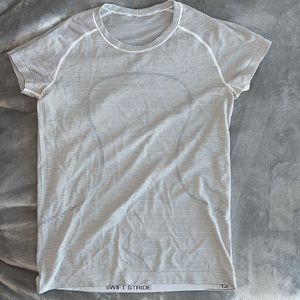 LULULEMON- Black and White Striped Swiftly Tech Short Sleeve 2.0